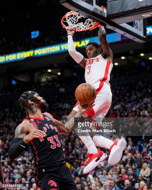Kevin Porter Jr. #3 of the Houston Rockets slam dunks against Gary Trent Jr. #33 of the Toronto Raptors during the first half at the Scotiabank Arena...