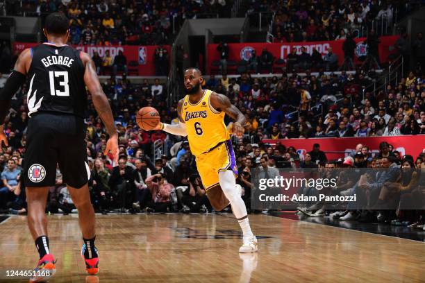 LeBron James of the Los Angeles Lakers handles the ball during the game against the LA Clippers on November 9, 2022 at Crypto.Com Arena in Los...