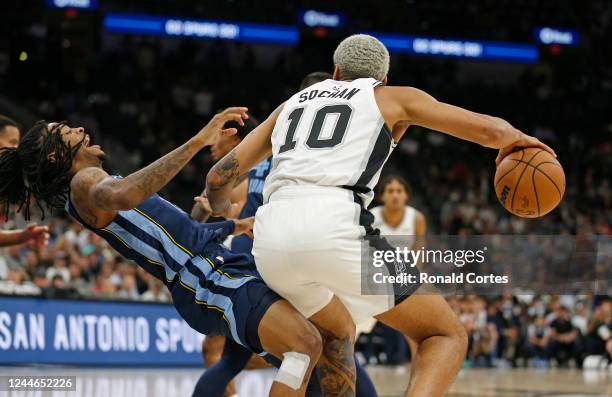 Ja Morant of the Memphis Grizzlies reacts after getting a charge call on Jeremy Sochan of the San Antonio Spurs in OT at AT&T Center on November 09,...