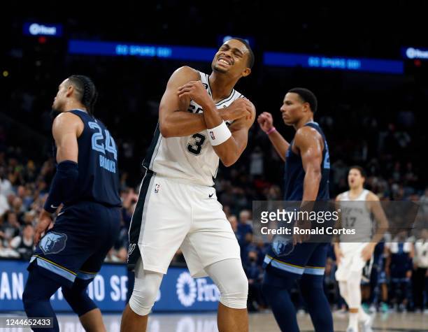 Keldon Johnson of the San Antonio Spurs reacts after his last shot in the second half would have given his team a victory over the Memphis Grizzlies...