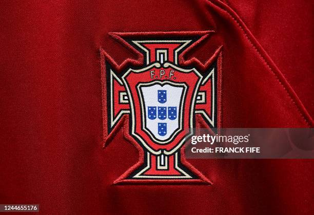 Picture taken on November 8, 2022 in Paris, shows the logo on a jersey of the Portugal national football team for the Football FIFA World Cup 2022 in...