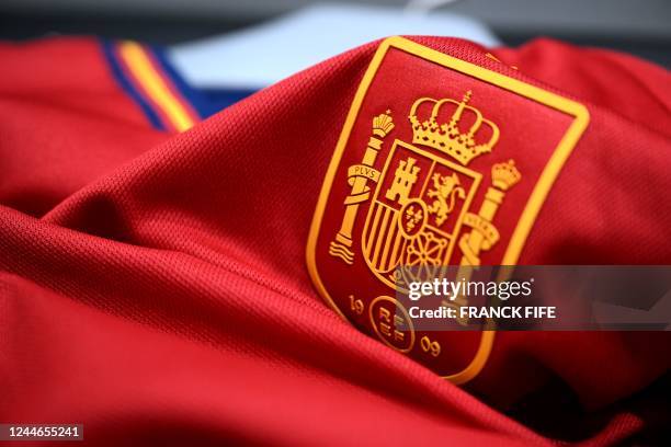 Picture taken on November 8, 2022 in Paris, shows the logo on a jersey of the Spain national football team for the Football FIFA World Cup 2022 in...