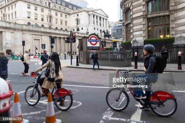 Commuters ride bikes, during a one day strike by London Underground workers, in London, UK, on Thursday, Nov. 10, 2022. Parisians and Londoners face...
