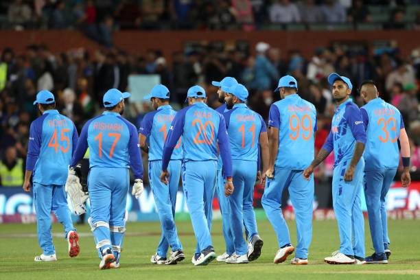 India's Captain Rohit Sharma escorts his team off the field after their loss during the ICC men's Twenty20 World Cup 2022 semi-final cricket match...