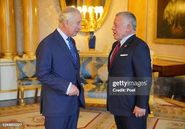 King Charles III greets King Abdullah II of Jordan during an audience at Buckingham Palace on November 10 in London, England.