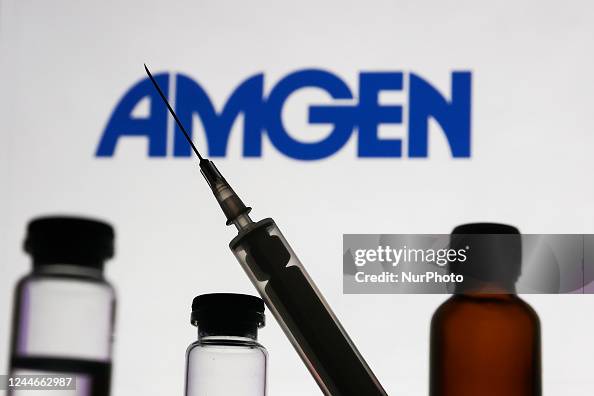 Anchen Medical bottles and syringe are seen with Amgen logo displayed on a ...