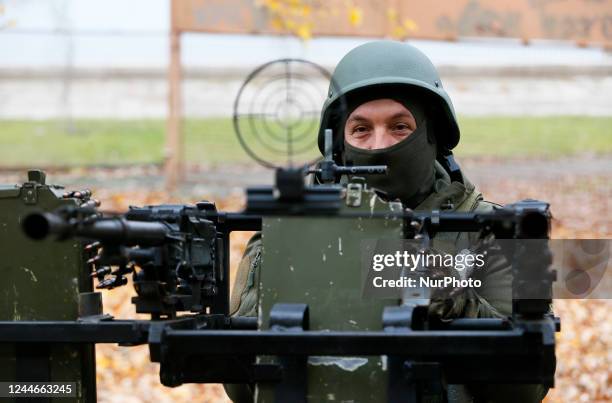 An Ukrainian serviceman of National Guard operates with a homemade anti-aircraft machine gun to destroy drones presented in Mykolaiv, Ukraine 9...