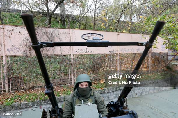 An Ukrainian serviceman of National Guard operates with a homemade anti-aircraft machine gun to destroy drones presented in Mykolaiv, Ukraine 9...