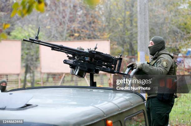 Ukrainian servicemen of National Guard operate with a homemade anti-aircraft machine gun to destroy drones presented in Mykolaiv, Ukraine 9 November...