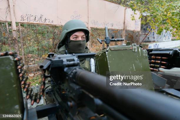 An Ukrainian serviceman of National Guard operates with a homemade anti-aircraft machine gun to destroy drones presented in Mykolaiv, Ukraine 9...