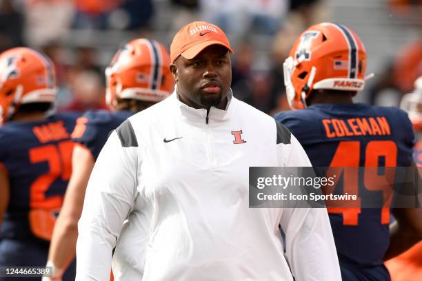 Illinois Fighting Illini defensive line coach Terrance Jamison walks across the field before the college football game between the Michigan State...