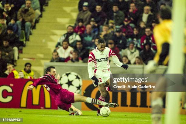 Jens NOWOTNY of Bayer and Thierry HENRY of Monaco during UEFA Champions League match between Bayer Leverkusen and AS Monaco,...