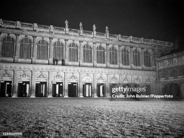 Students night climbing on one of the historic buildings at Cambridge University, England, circa June 1959. Night climbing describes the pursuit of...