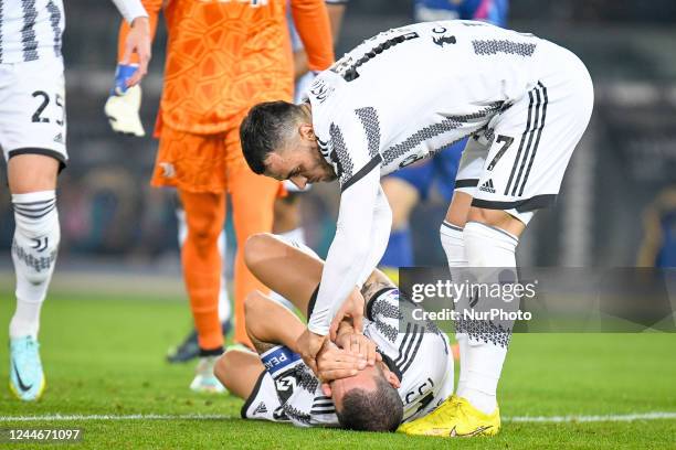 Juventus's Leonardo Bonucci injury helped by Juventus's Filip Kostic during the italian soccer Serie A match Hellas Verona FC vs Juventus FC on...