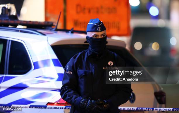 Police take security measures at crime scene where a policeman is killed as a result of knife attack at North Train Station in Brussels, Belgium on...