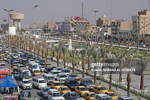 Previously abandoned promenade has been paved and planted with gardens of flowers and palm trees, at the Tahrir Square in the Iraqi capital Baghdad...
