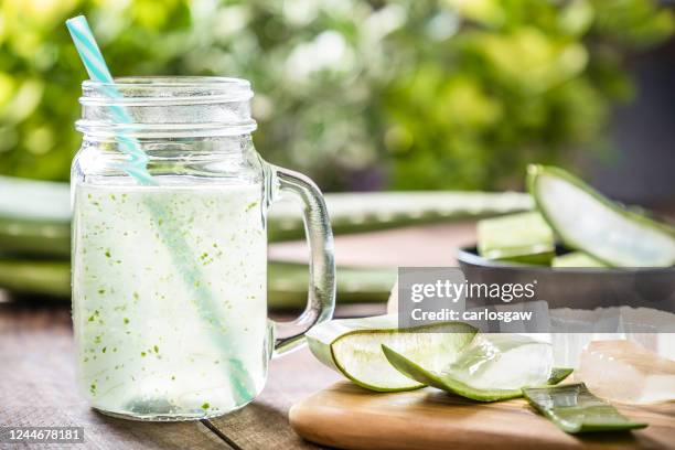 aloe vera drink - aloe slices stock pictures, royalty-free photos & images