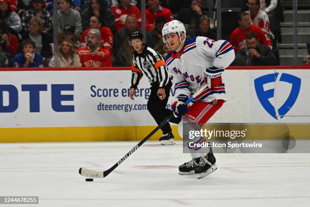 New York Rangers defenseman Adam Fox skates with the puck during the game between the Detroit Red Wings and the Montreal Canadiens on Thursday...