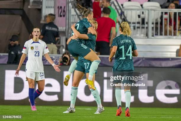 Klara Bühl of Germany celebrates with Paulina Krumbiegel after scoring a goal during the women's international friendly game against the United...