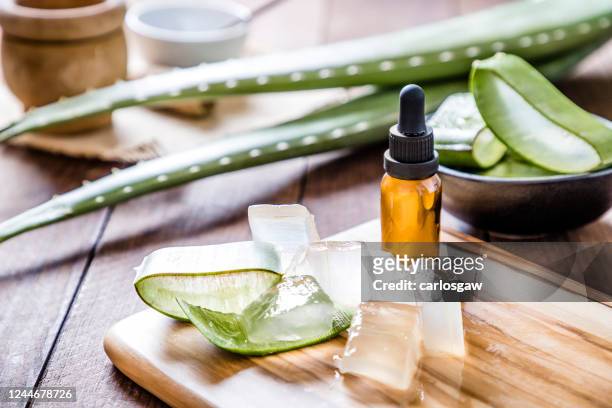 aloe vera crystals for a skin care - aloe slices stock pictures, royalty-free photos & images