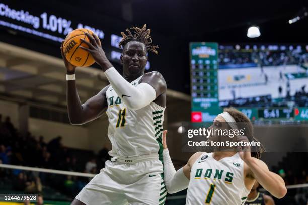 San Francisco Dons forward Josh Kunen grabs a rebound during the college mens basketball game between the Cal Poly Mustangs and the San Francisco...