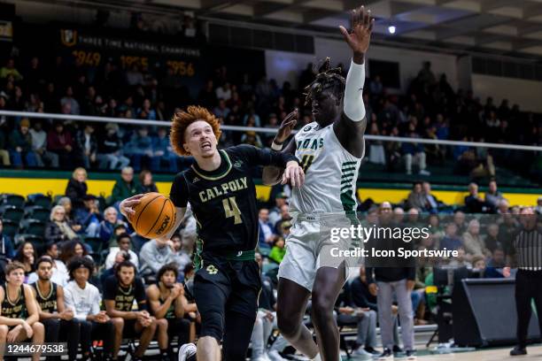 Cal Poly Mustangs guard Brantly Stevenson drives the lane during the college mens basketball game between the Cal Poly Mustangs and the San Francisco...