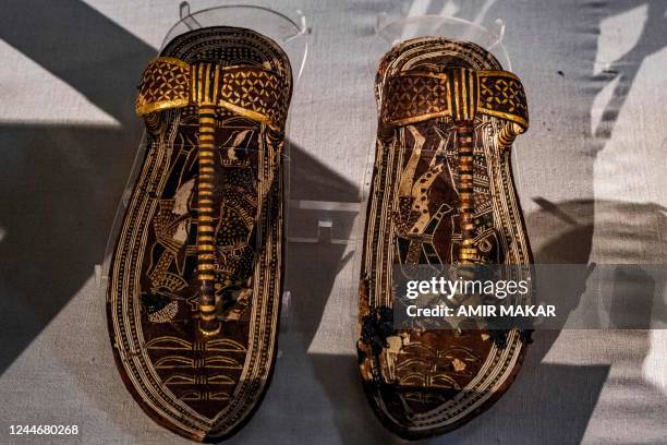 Pair of sandals depicting the Pharaoh's enemies belonging to the ancient Egyptian New Kingdom Pharaoh Tutankhamun , and found at his tomb KV62, are...