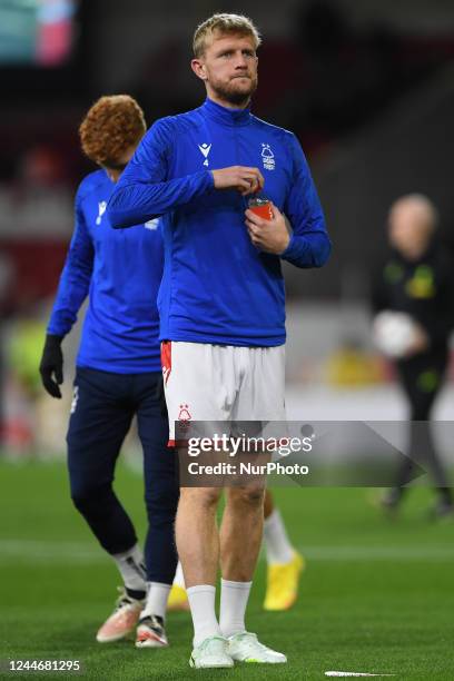 Joe Worrall of Nottingham Forest warms up ahead of kick-off during the Carabao Cup Third Round match between Nottingham Forest and Tottenham Hotspur...