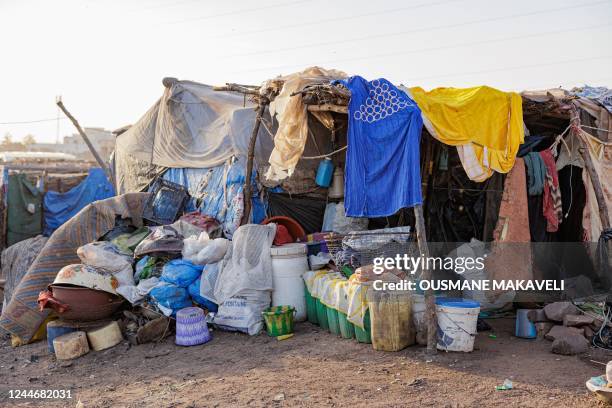 General view of a makeshift shelter at the Faladie internally displaced people camp in Bamako on November 9, 2022. - People fleeing a decade-long...