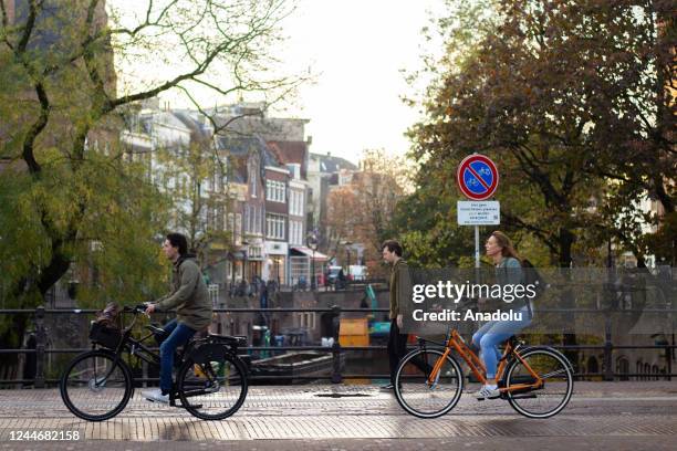 People ride bikes in Utrecht, Netherlands on November 04, 2022. Also known as the "land of bikes", Utrecht hosts the World's biggest bike parking...