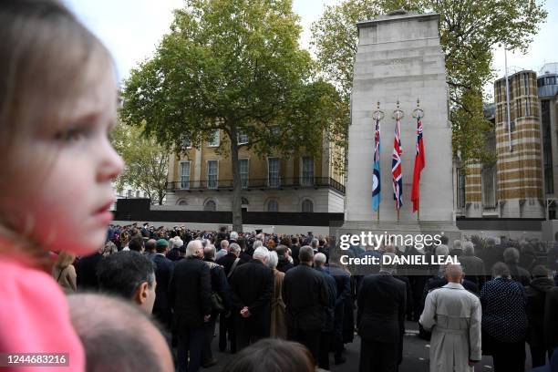 People observe a minutes' silence for Armistice Day, at the Cenotaph war memorial on Whitehall in central London, on November 11, 2022. - Armistice...