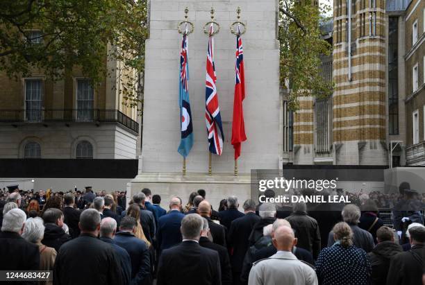 People observe a minutes' silence for Armistice Day, at the Cenotaph war memorial on Whitehall in central London, on November 11, 2022. - Armistice...