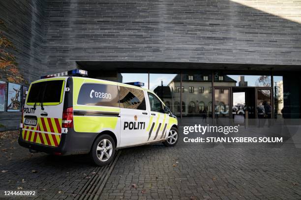 Police car stands outside the National Museum in Oslo, Norway, on November 11 after activists tried to glue themselves to the frame of Edvard Munch's...
