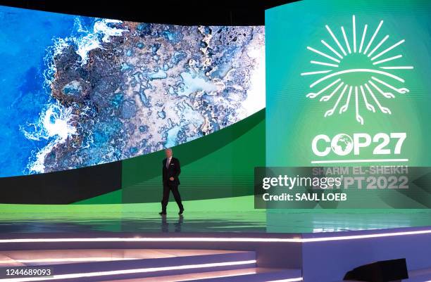 President Joe Biden arrives to deliver a speech during the COP27 summit in Egypt's Red Sea resort city of Sharm el-Sheikh, on November 11, 2022. -...