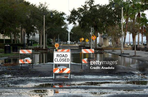 Road is seen closed after Hurricane Nicole pushed water from Lake Monroe over the seawall, on November 11, 2022 in Sanford, Florida. Nicole made...