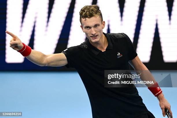 Czech Republic's Jiri Lehecka celebrates after his victory over Switzerland's Dominic Stricker during their men's semi-final match at the Next...