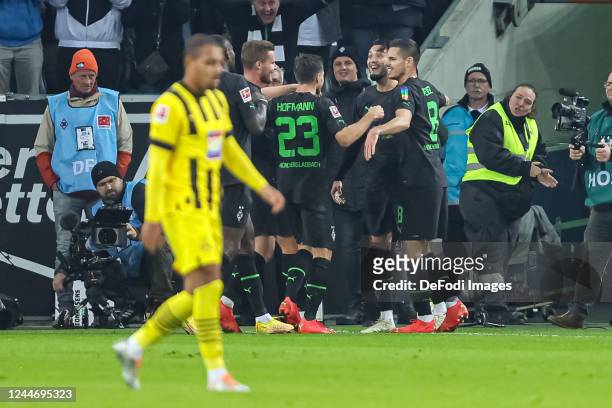 Ramy Bensebaini of Borussia Moenchengladbach celebrates after scoring his team's second goal with teammates during the Bundesliga match between...