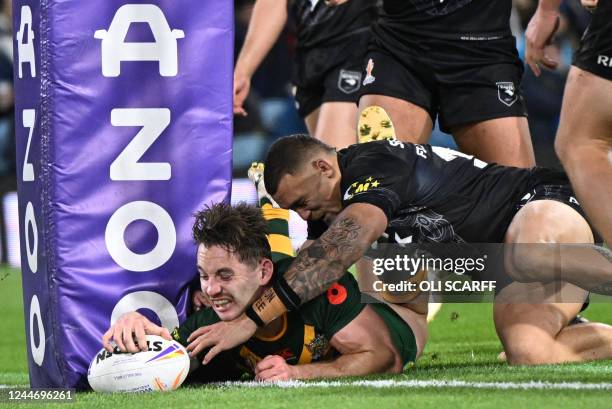 Australia's Cameron Murray scores a try during the 2021 rugby league World Cup men's semi-final match between Australia and New Zealand at the Elland...