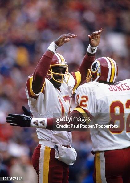 Ed Rubbert Washington Redskins quarterback Doug Williams celebrates victory with ...