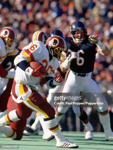 Washington Redskins running back Timmy Smith attempts to gain yardage during the NFC Divisional Playoff game between Chicago Bears and Washington...