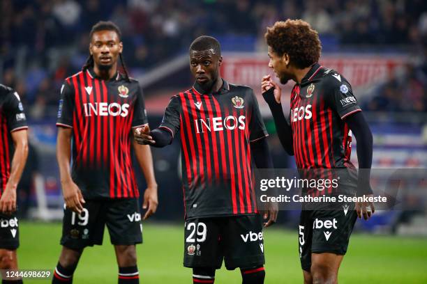 Nicolas Pepe of OGC Nice and Jean-Clair Todibo of OGC Nice are talking during the Ligue 1 match between Olympique Lyonnais and OGC Nice at Groupama...