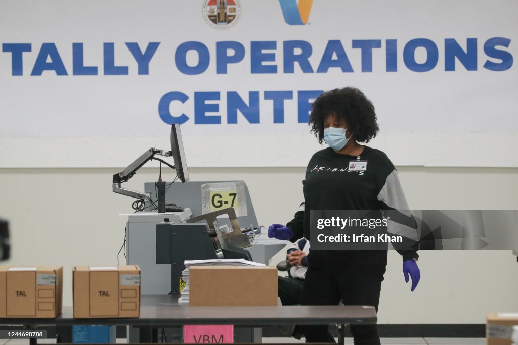 Ballots scanning and tabulation of votes in progress at Voting... News ...
