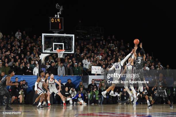 Michigan State Spartans guard Jaden Akins attempts to shoot a buzzer beater which misses the basket during the Armed Forces Classic Carrier Edition...