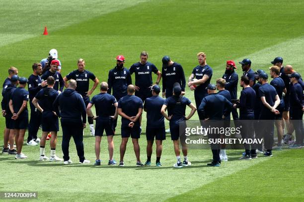 Team England huddle during a training session at the Melbourne Cricket Ground in Melbourne on November 12 ahead of the ICC men's Twenty20 World Cup...