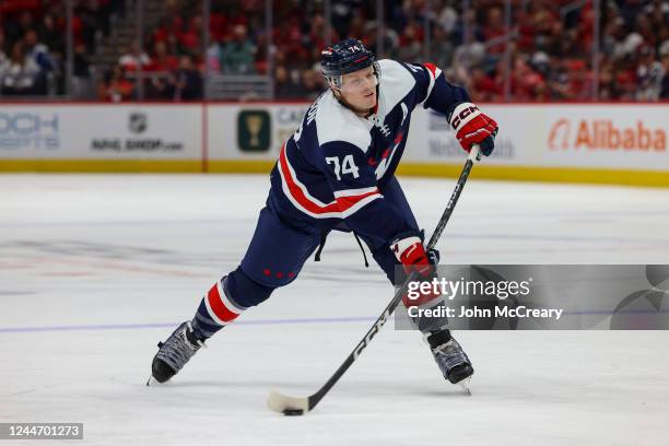 John Carlson of the Washington Capitals takes a shot on net during a game against the Tampa Bay Lightning at Capital One Arena on November 11, 2022...