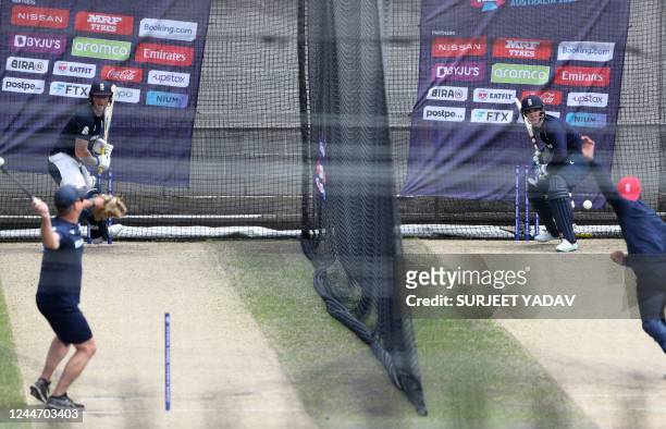 England's Ben Stokes and Harry Brook attend a net practice session at the Melbourne Cricket Ground in Melbourne on November 12 ahead of the ICC men's...