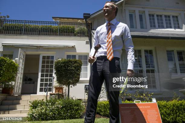 An auctioneer with a gavel following a residential home auction in the Rose Bay area in Sydney, Australia, on Saturday, Nov. 12, 2022. Australias...