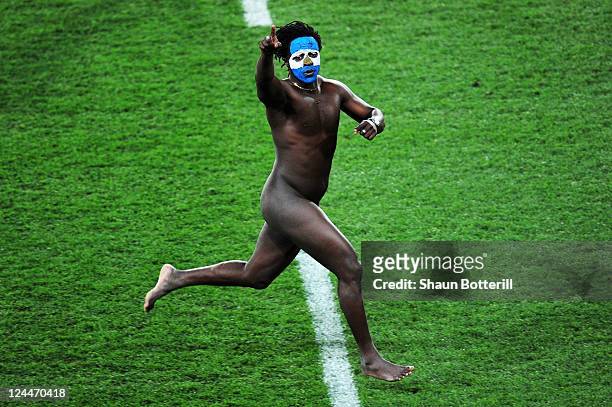 Streaker invades the pitch during the IRB 2011 Rugby World Cup Pool B match between Argentina and England at Otago Stadium on September 10, 2011 in...