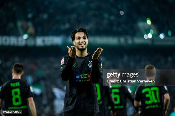 Ramy Bensebaini of Borussia Moenchengladbach celebrates after scoring his team's second goal during the Bundesliga match between Borussia...