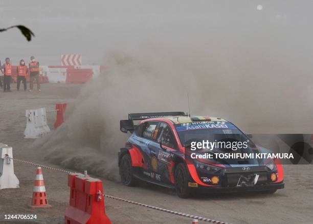 Thierry Neuville and his co-driver Martijn Wydaeghe of Belgium drive their Hyundai i20 N Rally1 Hybrid during the Rally Japan, the 13th round of the...
